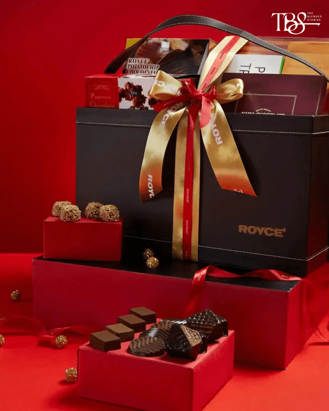 Celebration Basket — ROYCE’ A beautifully packed assortment for the sister whose idea of the perfect gift starts with something sweet. Price: ₹10,715
