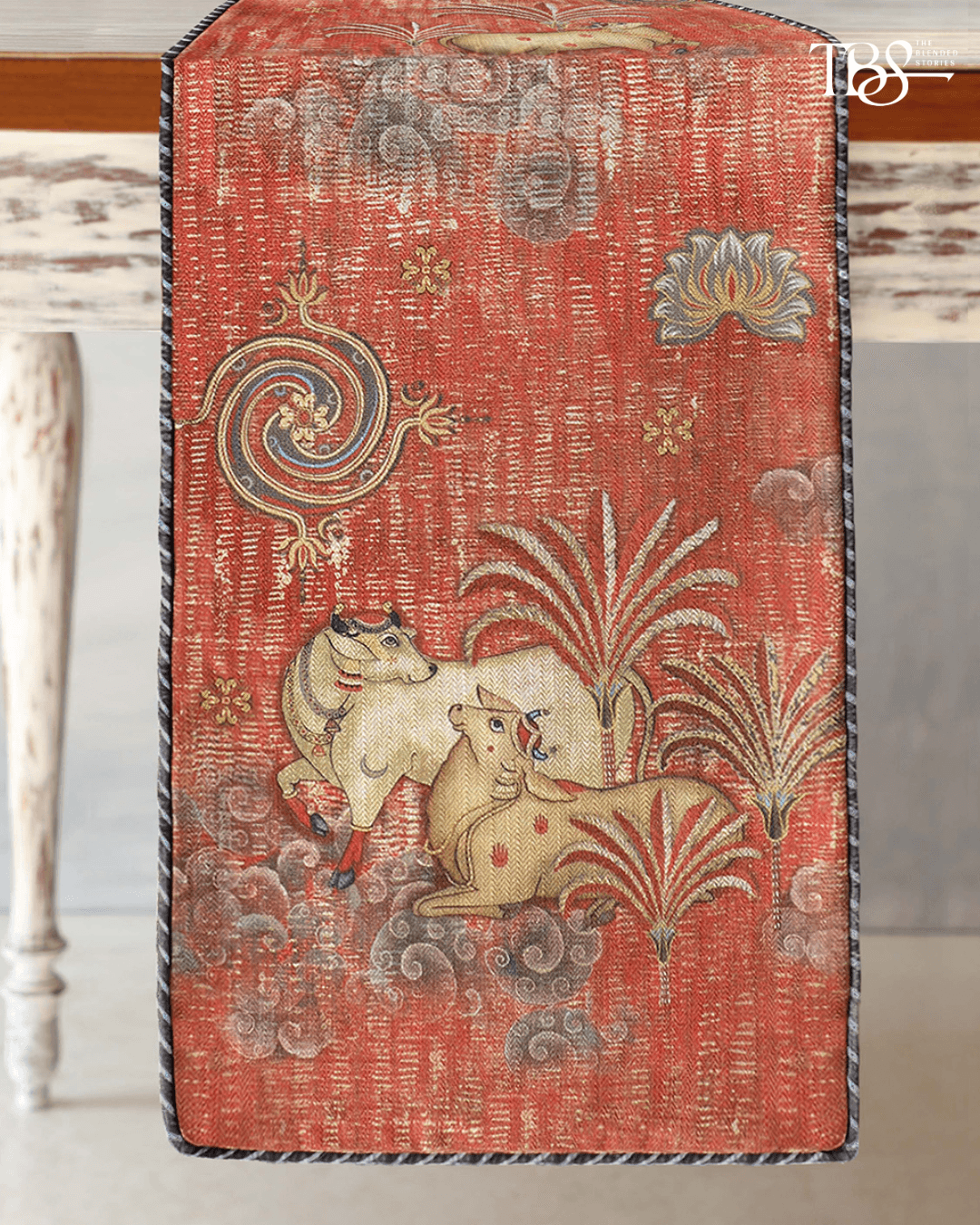 Kainaat's Tanjore Pichwai Rust Table Runner,