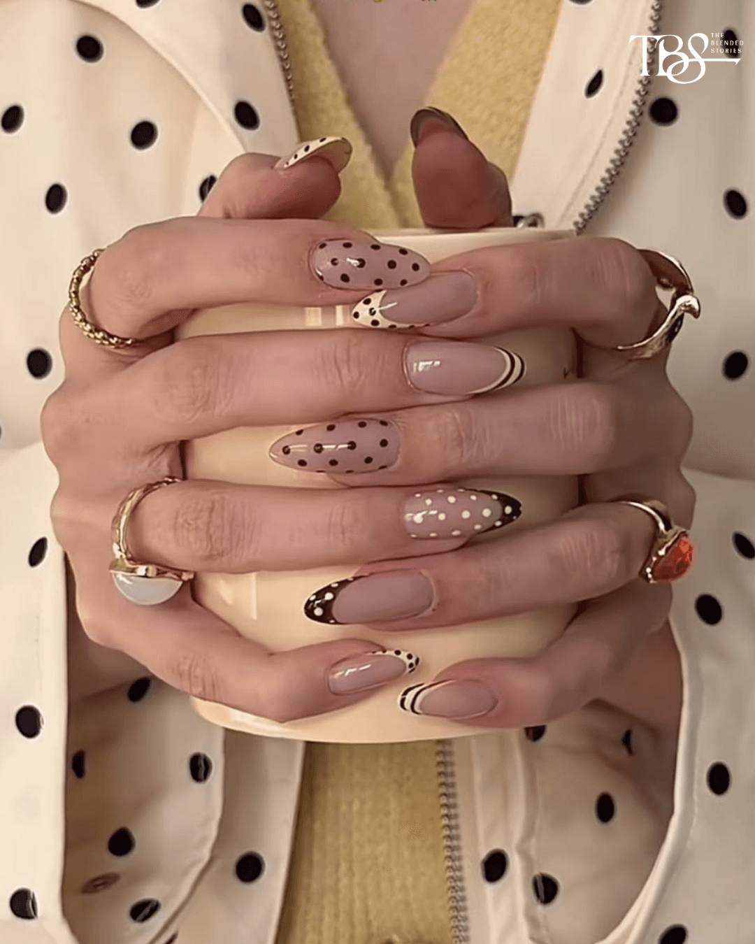 POLKA DOTS - The print followed us here. Tiny dots, oversized spots and tonal versions give the manicure just enough playfulness.